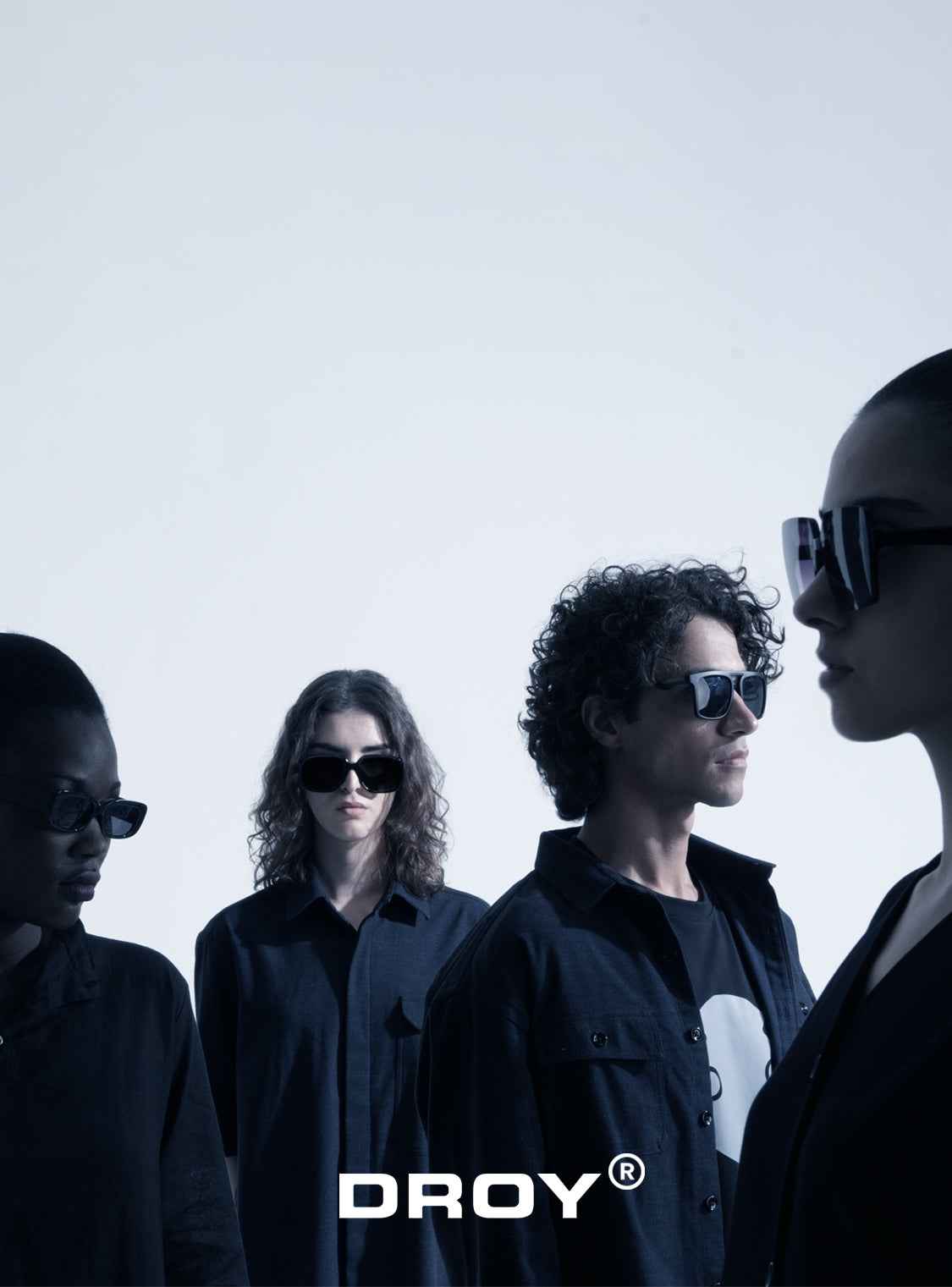 Four people wearing sunglasses with 'DROY' logo on a white background